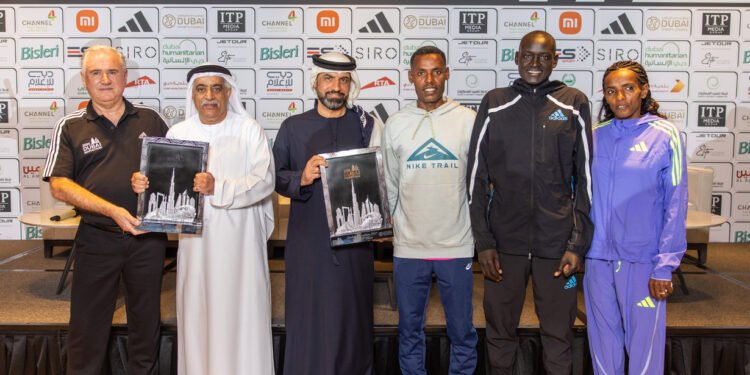 Dubai Sports Council and (left to right): Lelisa Desisa, Dennis Kimetto and Dera Dida.